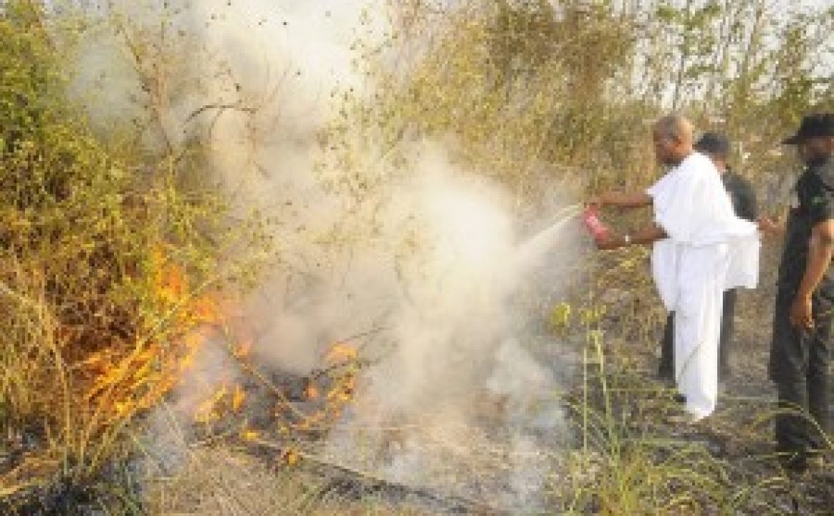 LEADING BY EXAMPLE: Aregbesola Became A Fire Fighter Along Osogbo – Ilesha Road