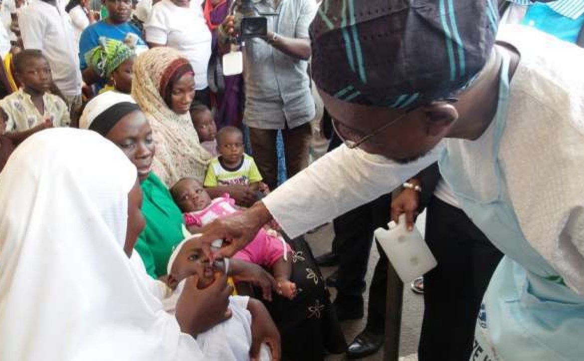 Aregbesola-during-the-Measies-immunization-Campaign